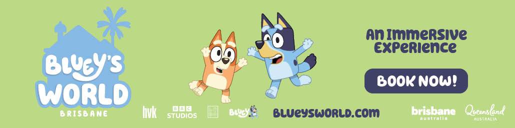 Bluey and Bingo in front of the Brisbane River Bluey and Bingo in front of the Brisbane River